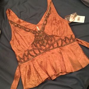 Antique pink peplum free people